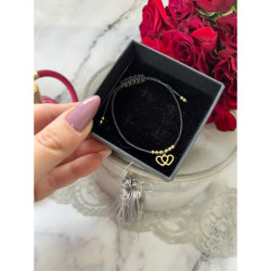 954 Bransoletka na sznurku ZŁĄCZONE SERCA STAL 316