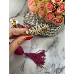 Sztywna bransoletka z imieniem NATALIA CYRKONIE